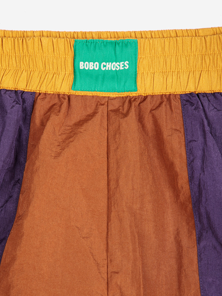 Shiny color block nylon shorts