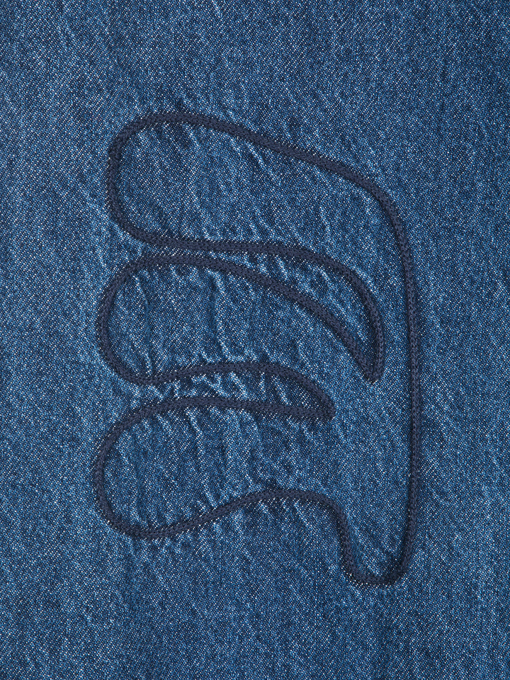 Embroidery washed mid-waist jeans