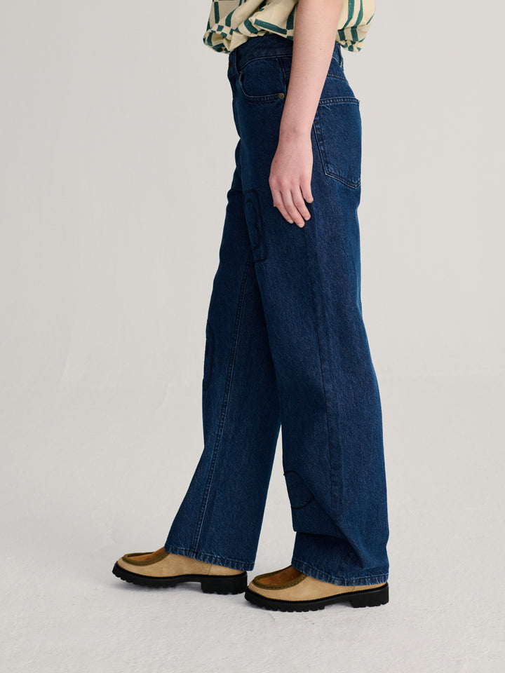 Embroidery washed mid-waist jeans
